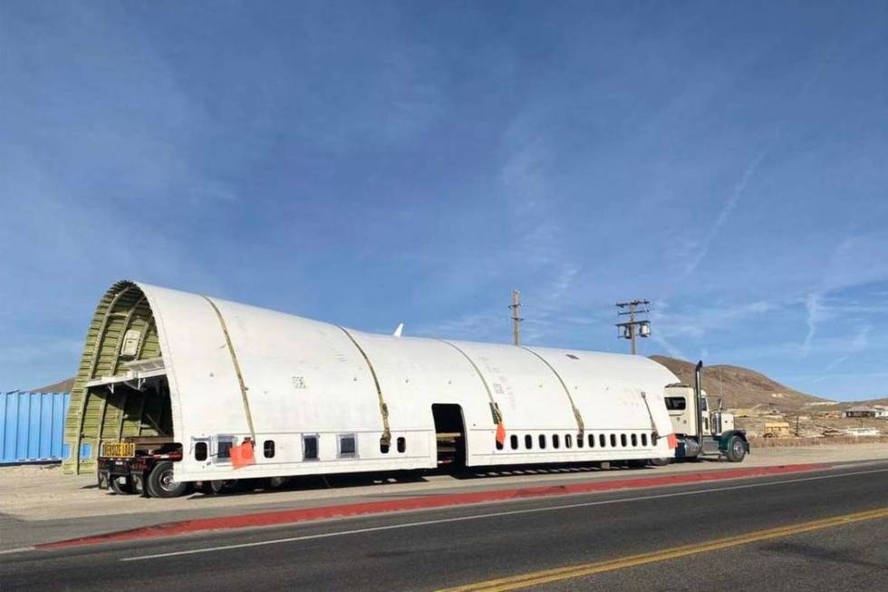 Part of the fuselage of a Boeing 747 used in Burning Man makes a pit stop in Tonopah, en route ...