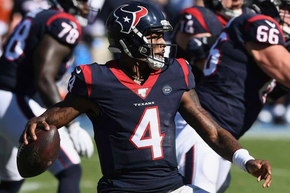 Houston Texans quarterback Deshaun Watson (4) throws a pass during an NFL football game against ...