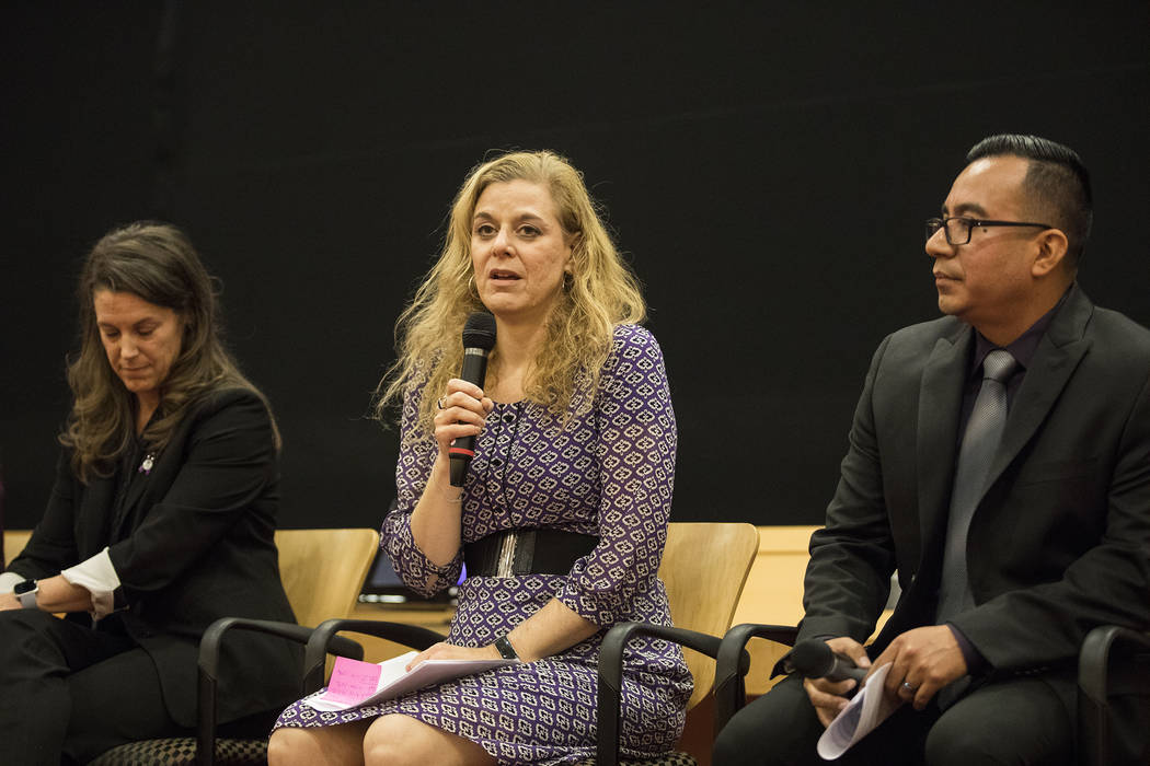 Daniele Staple, executive director of the Rape Criss Center, speaks at a panel discussion about ...