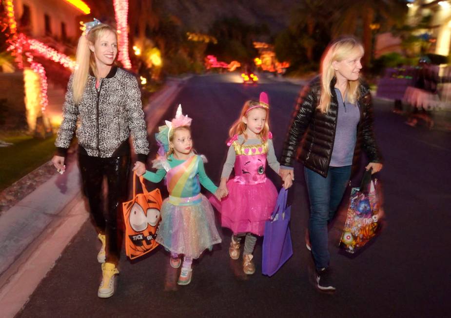 Brittany Godard, left, is shown with her daughters, Max and Catalina, and her mother, Nancy Web ...