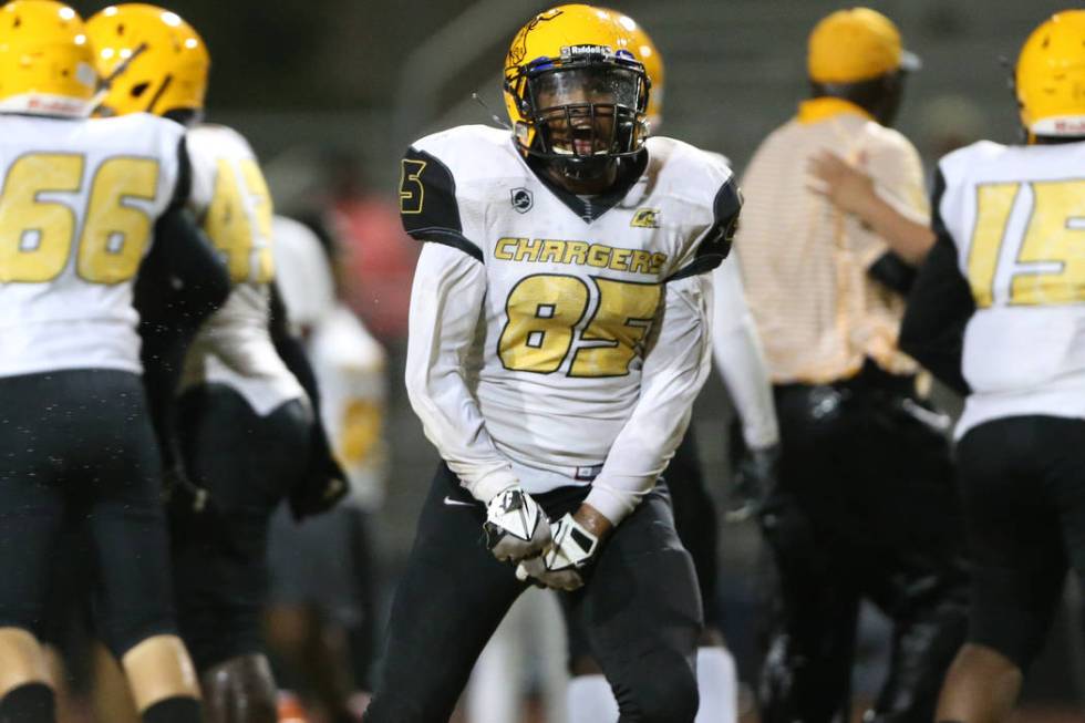 Clark's Kameran Cason (85) celebrates his team's win 27-20 against Chaparral in a football game ...