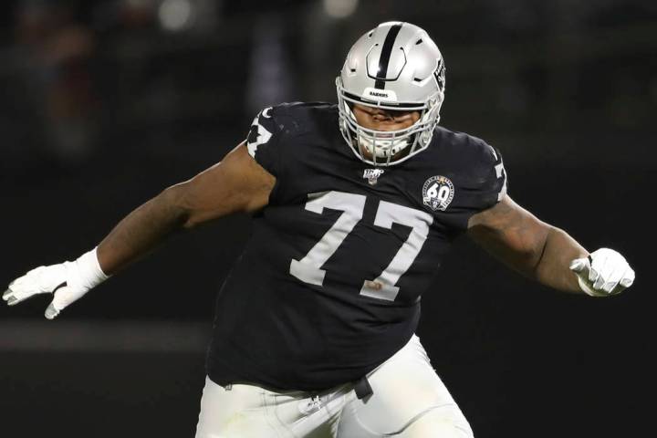 Oakland Raiders offensive tackle Trent Brown (77) protects a gap in the offensive line during a ...