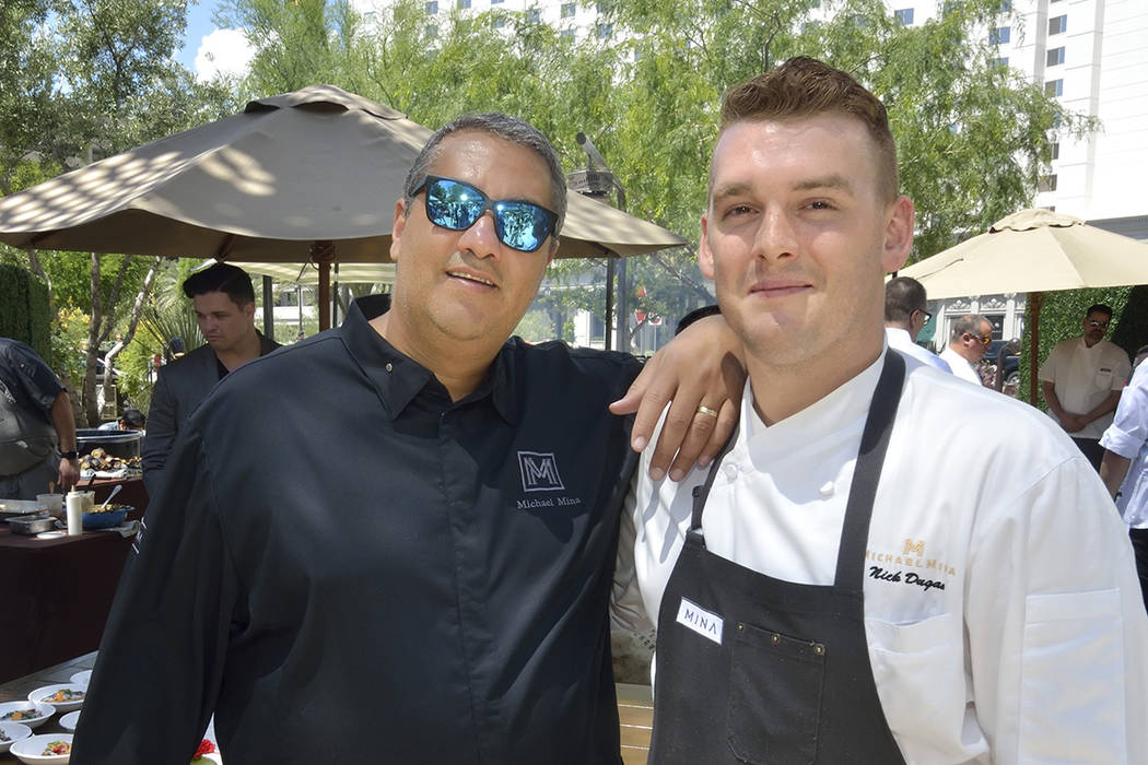 Chef Michael Mina, left, and Nick Dugan, executive chef at Michael Mina Bellagio, are shown dur ...