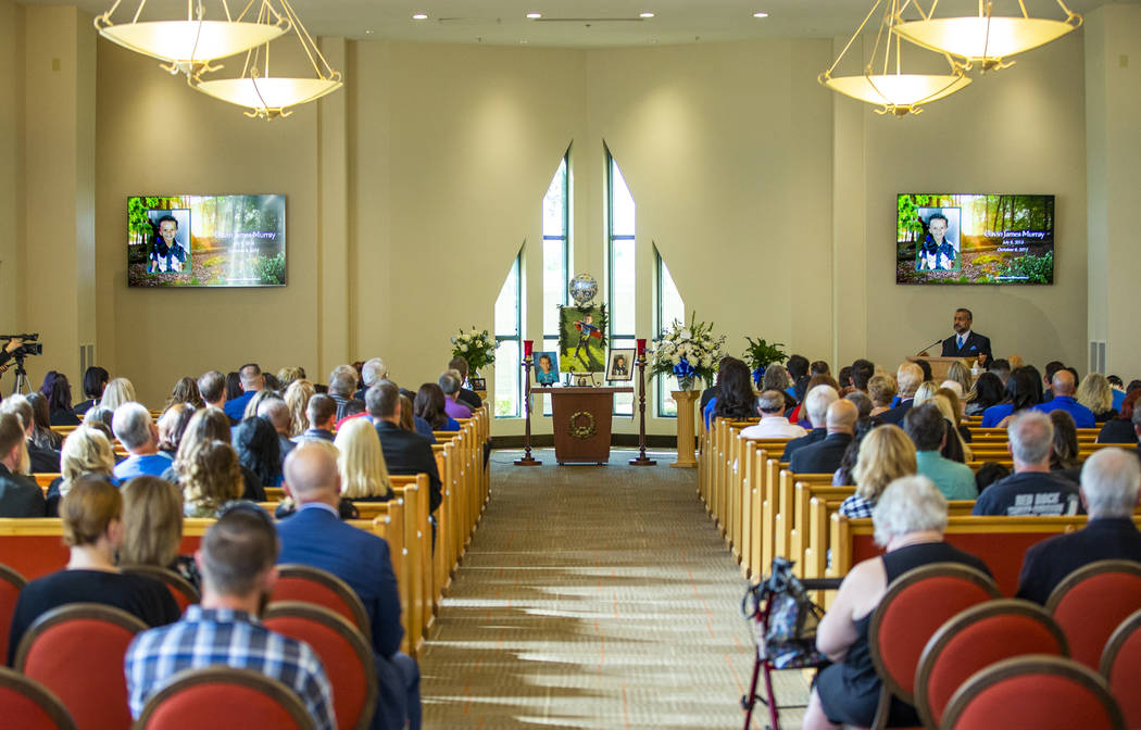 Rev. Jacob Jacoby gives a sermon during funeral services for Gavin Murray, 6, at Palm Mortuary ...