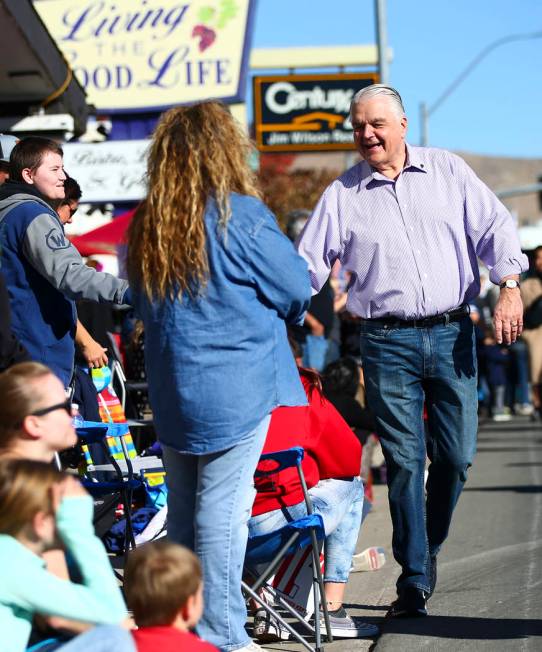 Gov. Steve Sisolak greets attendees during the annual Nevada Day Parade in Carson City on Satur ...