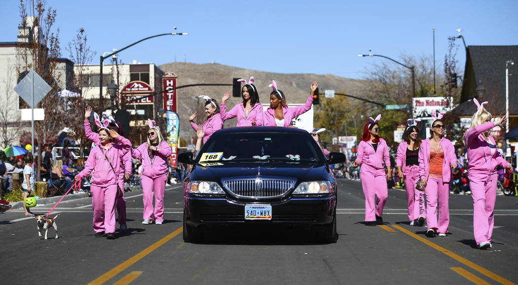 Members of the Moonlite BunnyRanch participate in the annual Nevada Day Parade in Carson City o ...