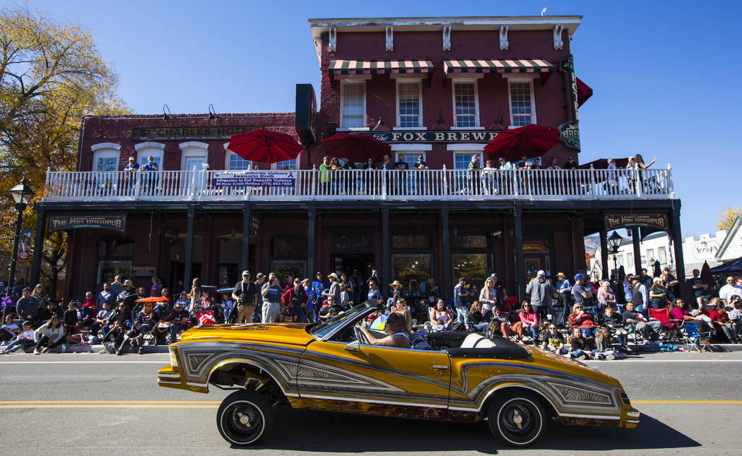 A member of the Uniques Car Club drives a lowrider during the annual Nevada Day Parade in Carso ...
