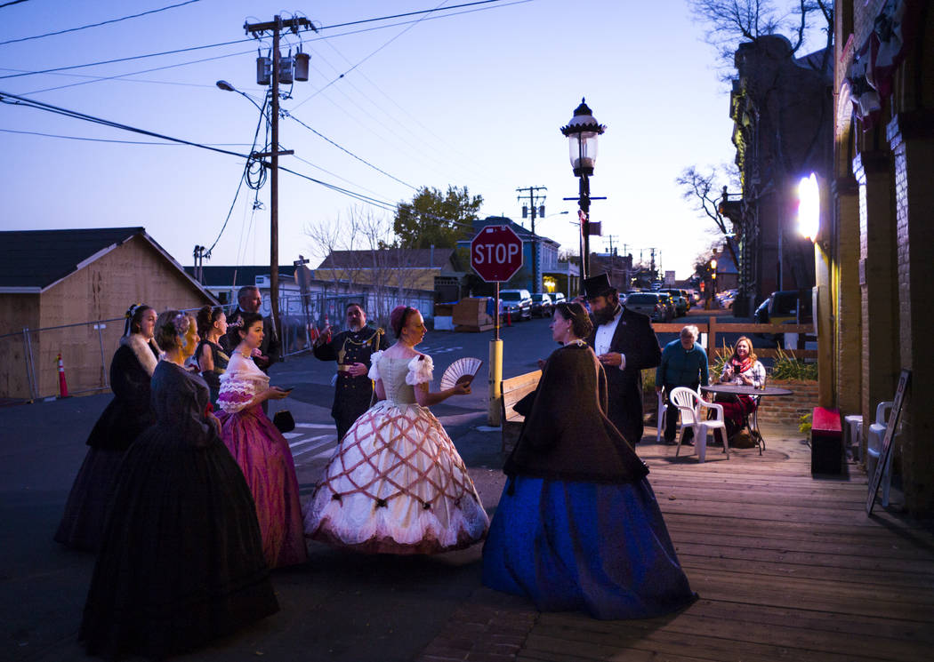 Attendees in period outfits arrive at Piper's Opera House for the Nevada Statehood Ball in Virg ...