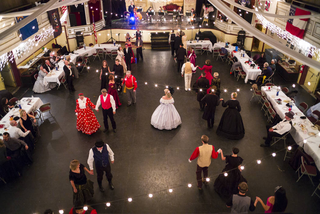 Attendees dance during the Nevada Statehood Ball at Piper's Opera House in Virginia City on Sat ...