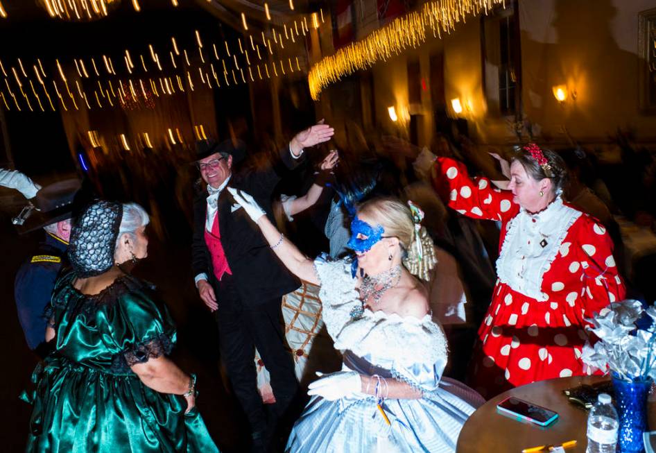 Attendees dance during the Nevada Statehood Ball in Virginia City on Saturday, Oct. 26, 2019. ( ...