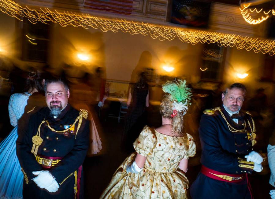 Attendees dance during the Nevada Statehood Ball in Virginia City on Saturday, Oct. 26, 2019. ( ...