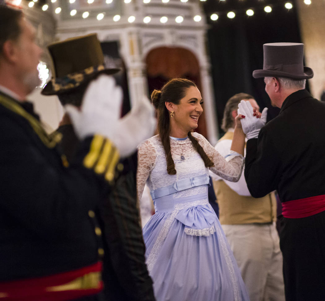 Shannon Stehle, of Reno, dances during the Nevada Statehood Ball in Virginia City on Saturday, ...