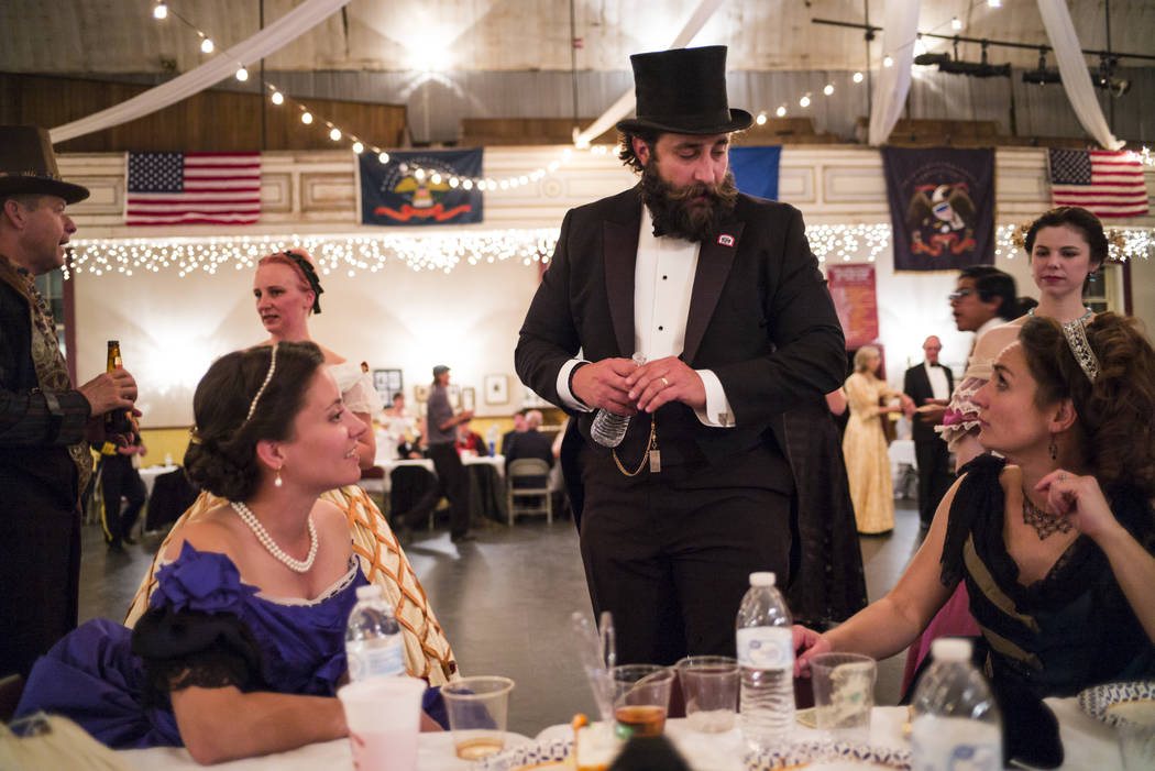 Attendees mingle during the Nevada Statehood Ball in Virginia City on Saturday, Oct. 26, 2019. ...
