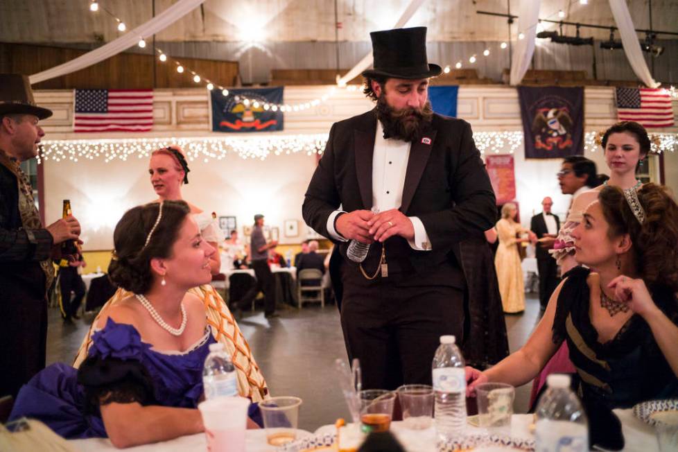 Attendees mingle during the Nevada Statehood Ball in Virginia City on Saturday, Oct. 26, 2019. ...