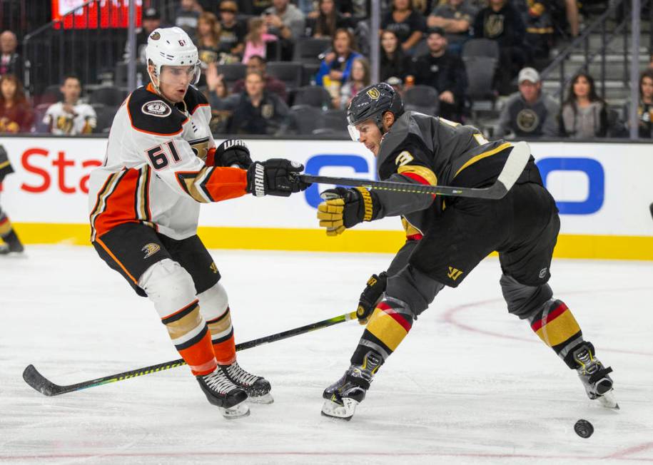 Anaheim Ducks center Troy Terry (61) has a shot deflected by Vegas Golden Knights defenseman Br ...