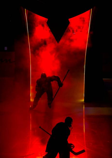 Vegas Golden Knights right wing Mark Stone (61) enters the ice through the helmet as Vegas Gold ...