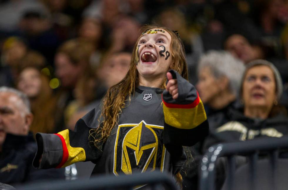 A Vegas Golden Knights fan see herself on the big screen as the team faces the Anaheim Ducks du ...