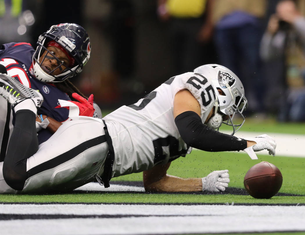 Oakland Raiders free safety Erik Harris (25) deflects a pass intended for Houston Texans wide r ...