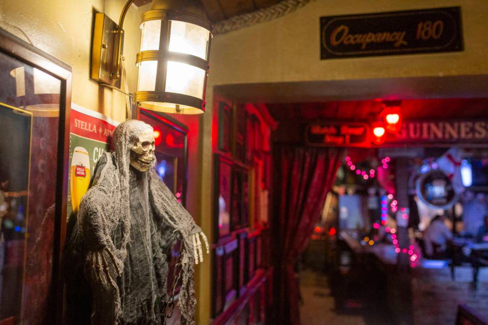 Halloween decor hangs in the allegedly "haunted" Crown & Anchor Pub in Las Vegas on Friday, Oct ...