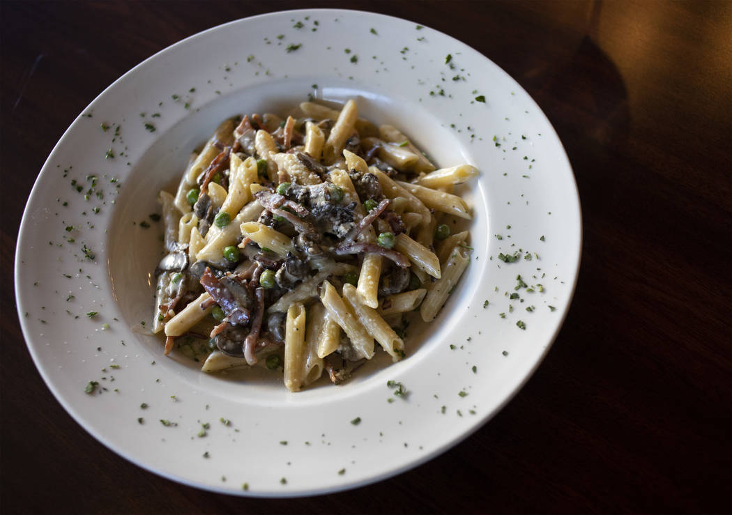 Speck, a pasta dish at Spaghetty Western, includes mushrooms, peas, smoked prosciutto and a fou ...