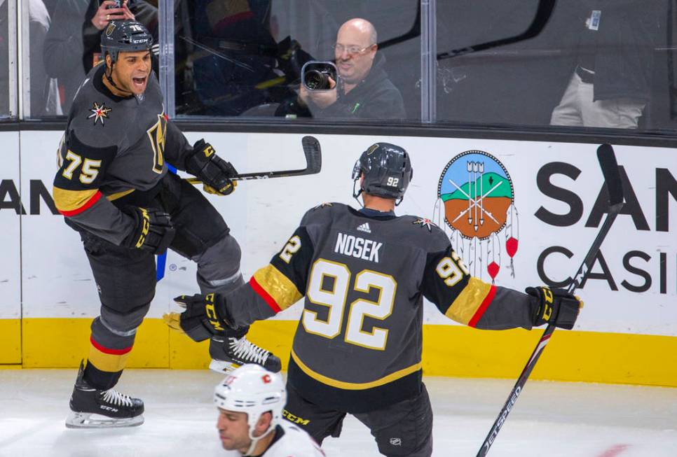 Vegas Golden Knights right wing Ryan Reaves (75) celebrates his first goal of the season with l ...