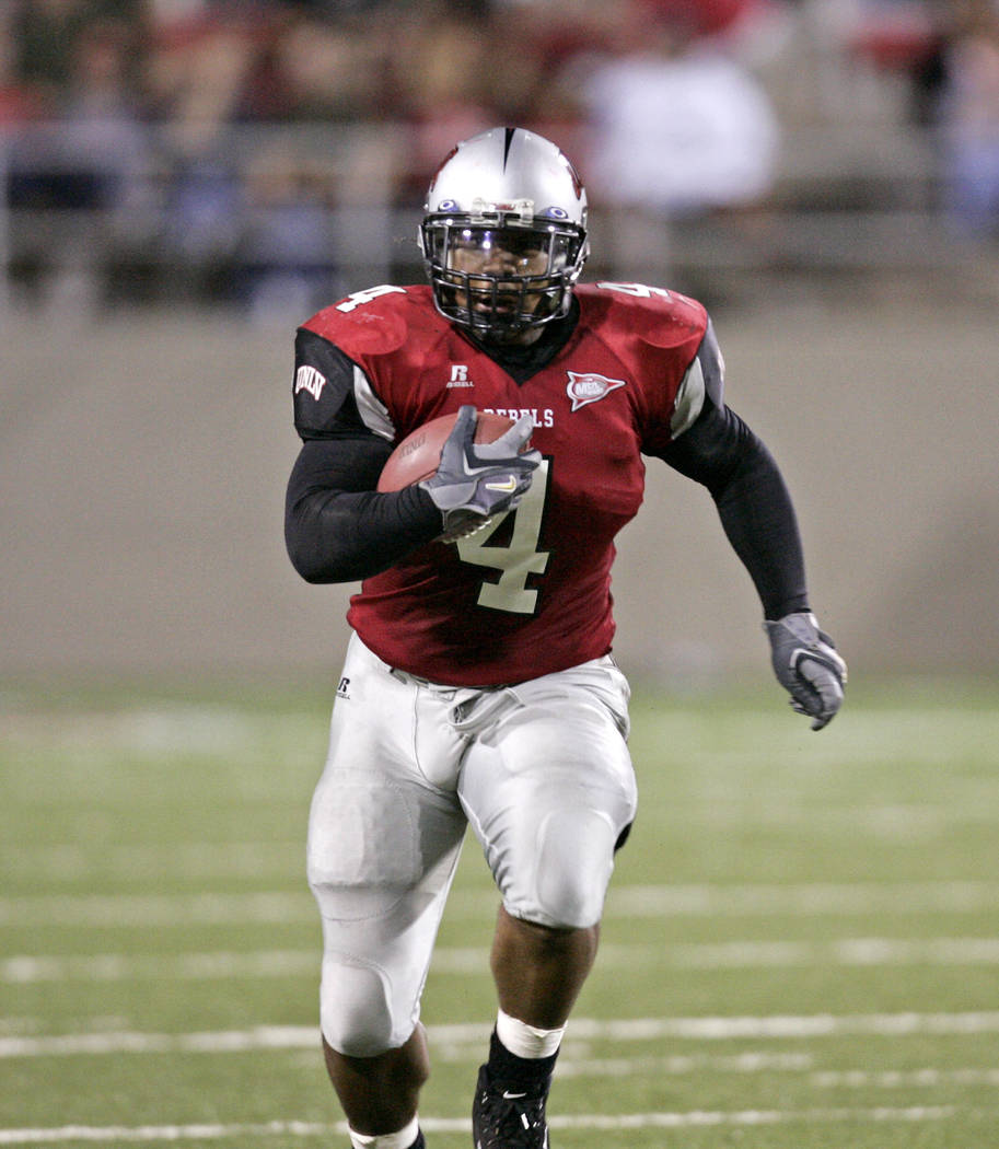 UNLV's Frank Summers breaks free for a long run during the Rebels' 27-0 shutout victory over Ut ...