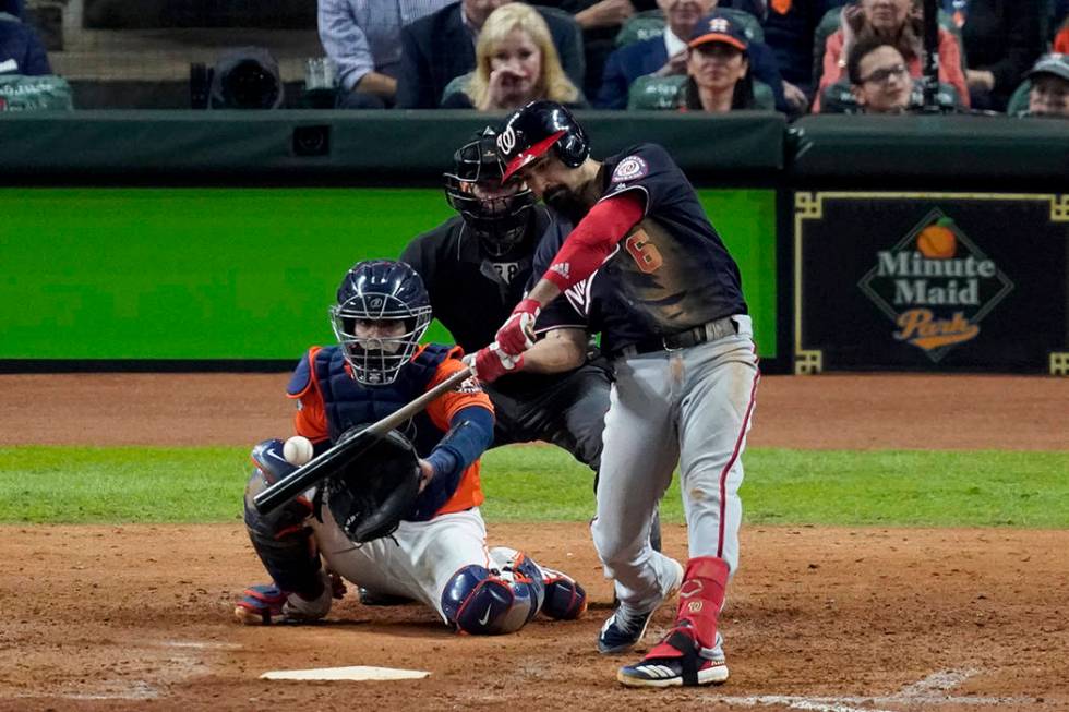 Washington Nationals' Anthony Rendon hits a home run against the Houston Astros during the seve ...