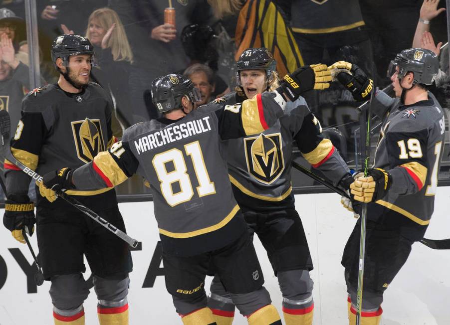 Vegas Golden Knights center William Karlsson (71) celebrates his first period goal with Vegas G ...