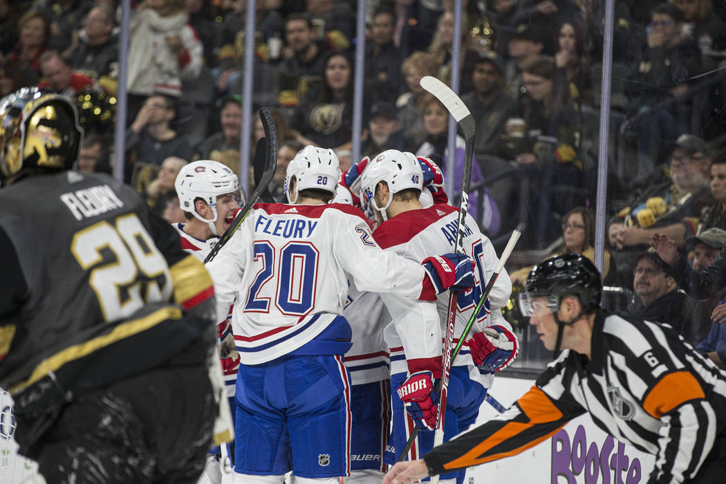 Montreal Canadiens defenseman Cale Fleury (20) and Montreal Canadiens right wing Joel Armia (40 ...