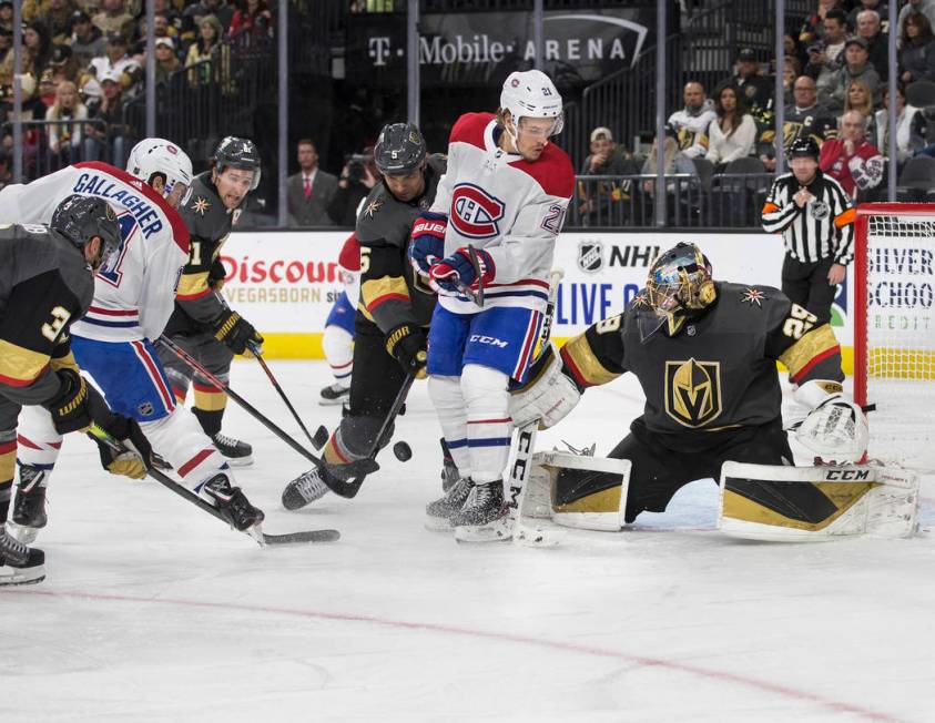 Vegas Golden Knights goaltender Marc-Andre Fleury (29) makes a save in traffic against Montreal ...