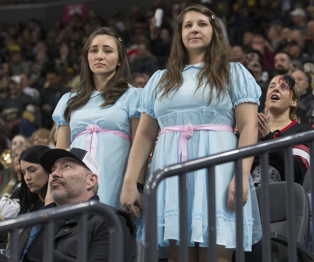 Vegas fans dress up for Halloween at T-Mobile Arena during the Golden Knights NHL hockey game w ...