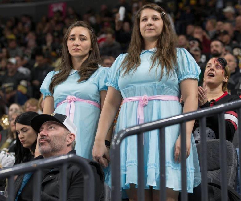 Vegas fans dress up for Halloween at T-Mobile Arena during the Golden Knights NHL hockey game w ...