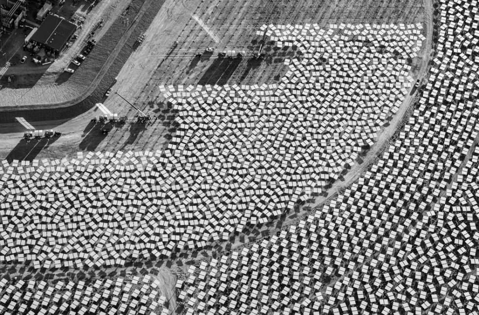 Heliostat installation adjacent to Unit 1 power block. "The Evolution of Ivanpah Solar," featur ...