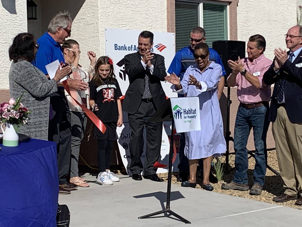 A Las Vegas single mom received the keys to her brand-new Habitat for Humanity home during an O ...