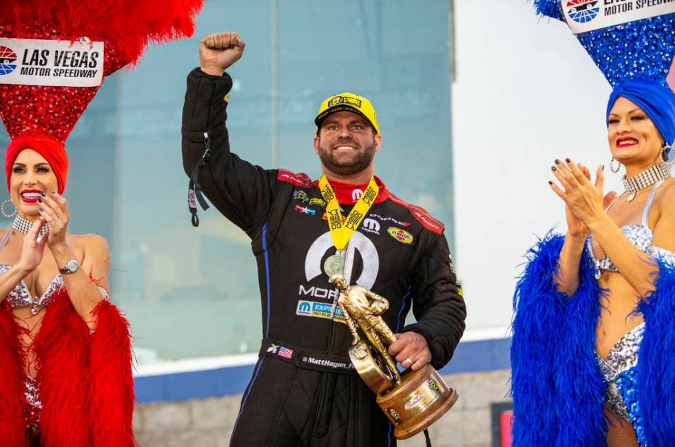 Funny Car racer Matt Hagan celebrates his win in the final round of the Dodge NHRA Nationals at ...