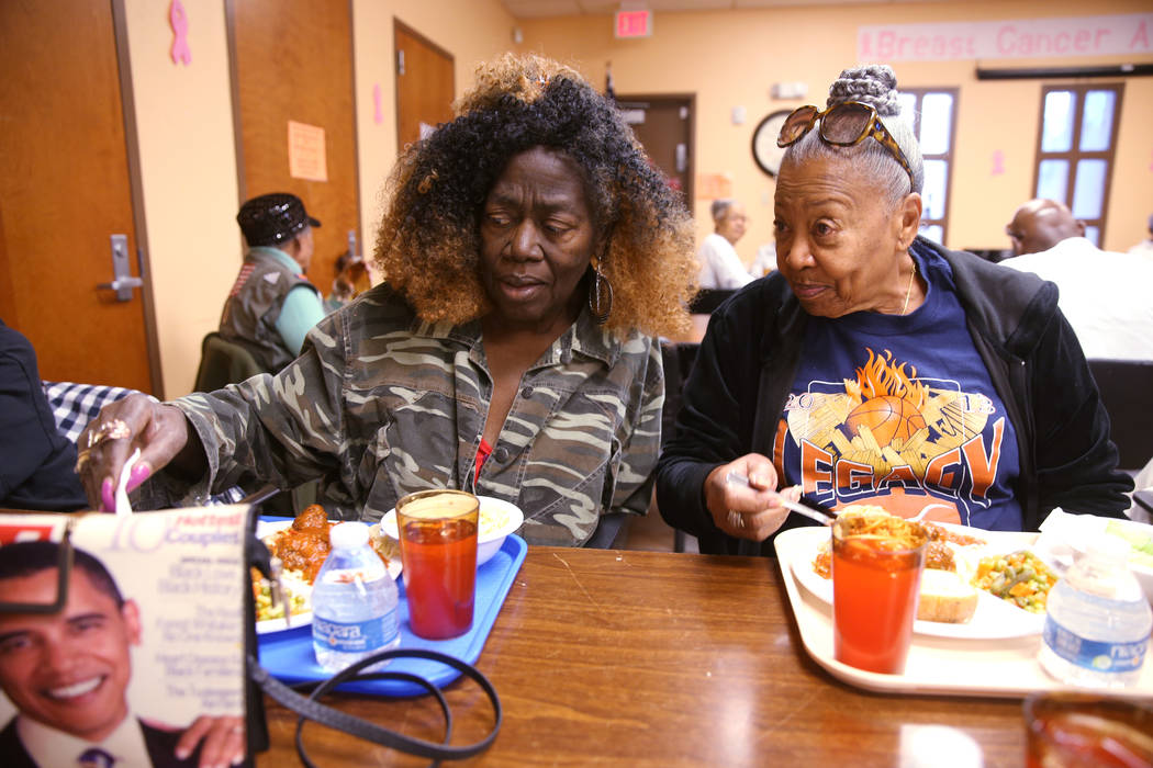 Peggy Branch, left, and Edna Banks visit during lunch at Martin Luther King Jr. Senior Center i ...