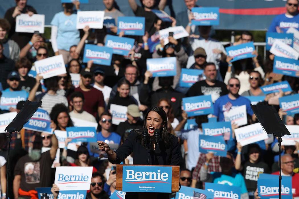 Rep. Alexandria Ocasio-Cortez, D-N.Y., speaks during a campaign rally for Democratic presidenti ...