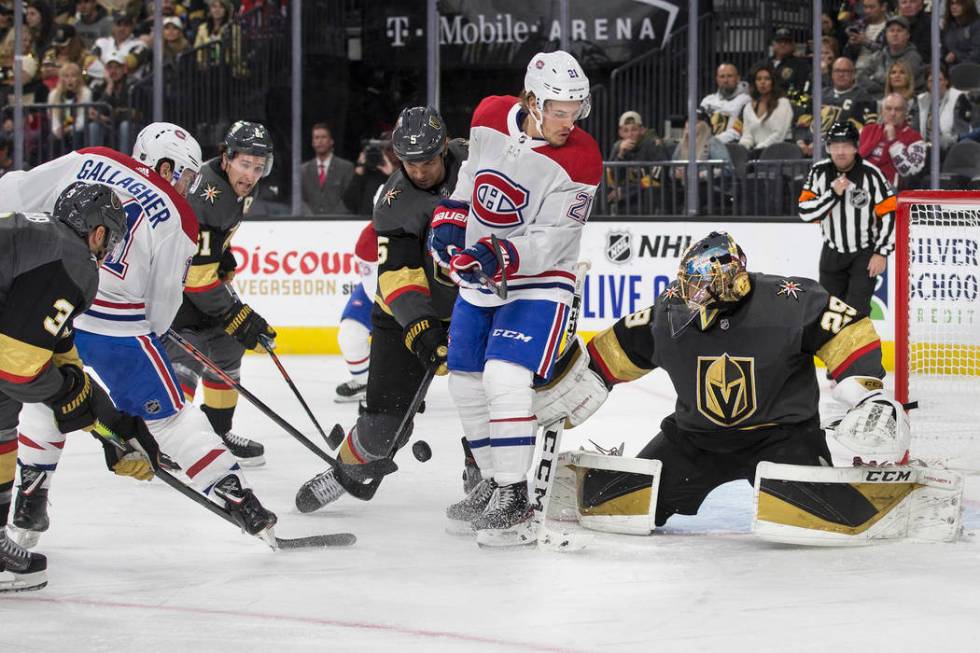 Vegas Golden Knights goaltender Marc-Andre Fleury (29) makes a save in traffic against Montreal ...