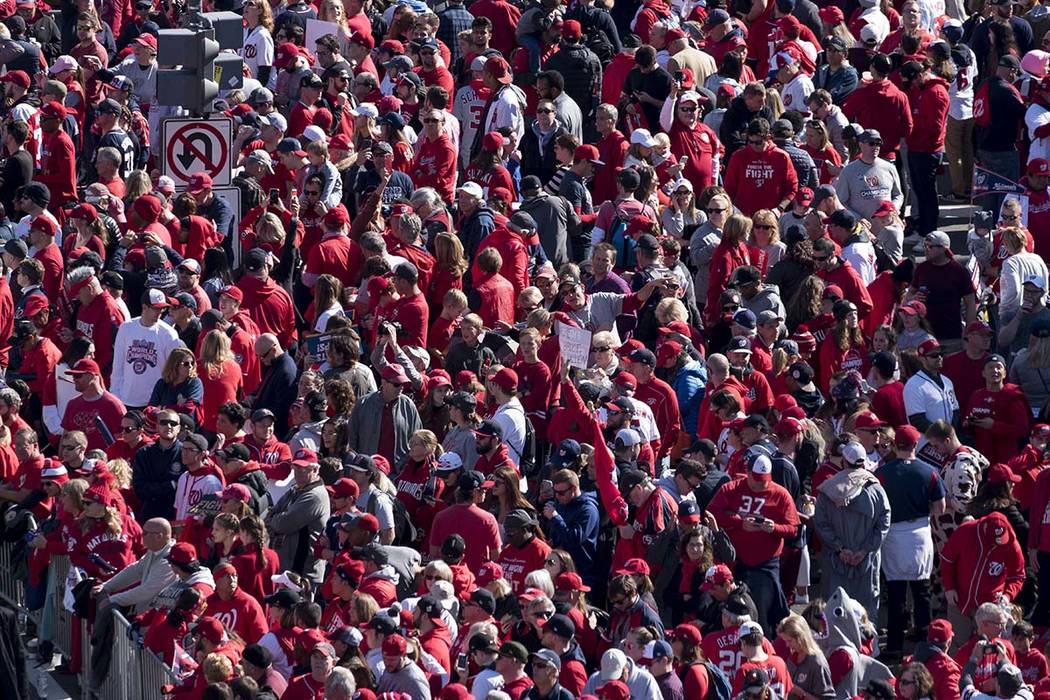 Fans wait for the start of the MLB Washington Nationals celebration of the team's World Series ...