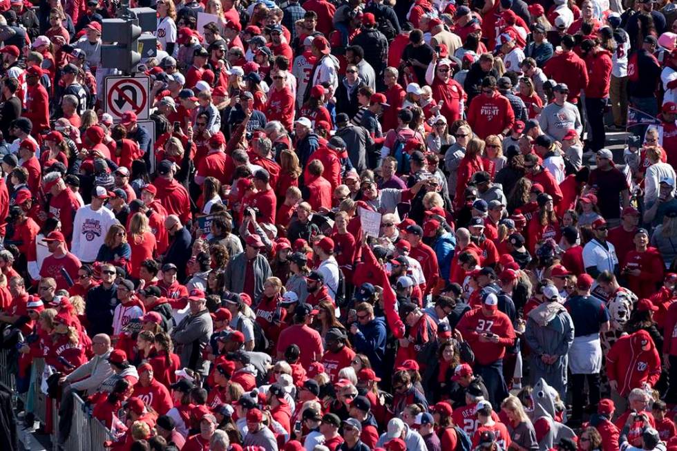 Fans wait for the start of the MLB Washington Nationals celebration of the team's World Series ...