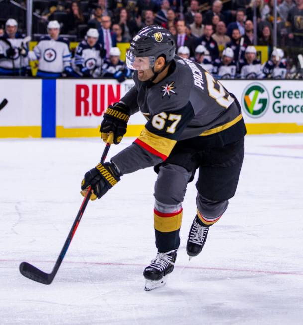 Vegas Golden Knights left wing Max Pacioretty (67) shoots and scores on Winnipeg Jets goaltende ...