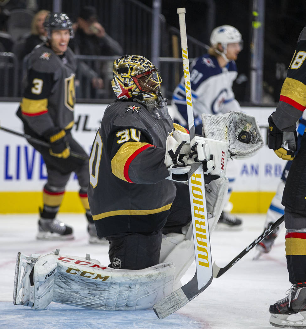 Vegas Golden Knights goaltender Malcolm Subban (30) saves another shot by the Winnipeg Jets dur ...