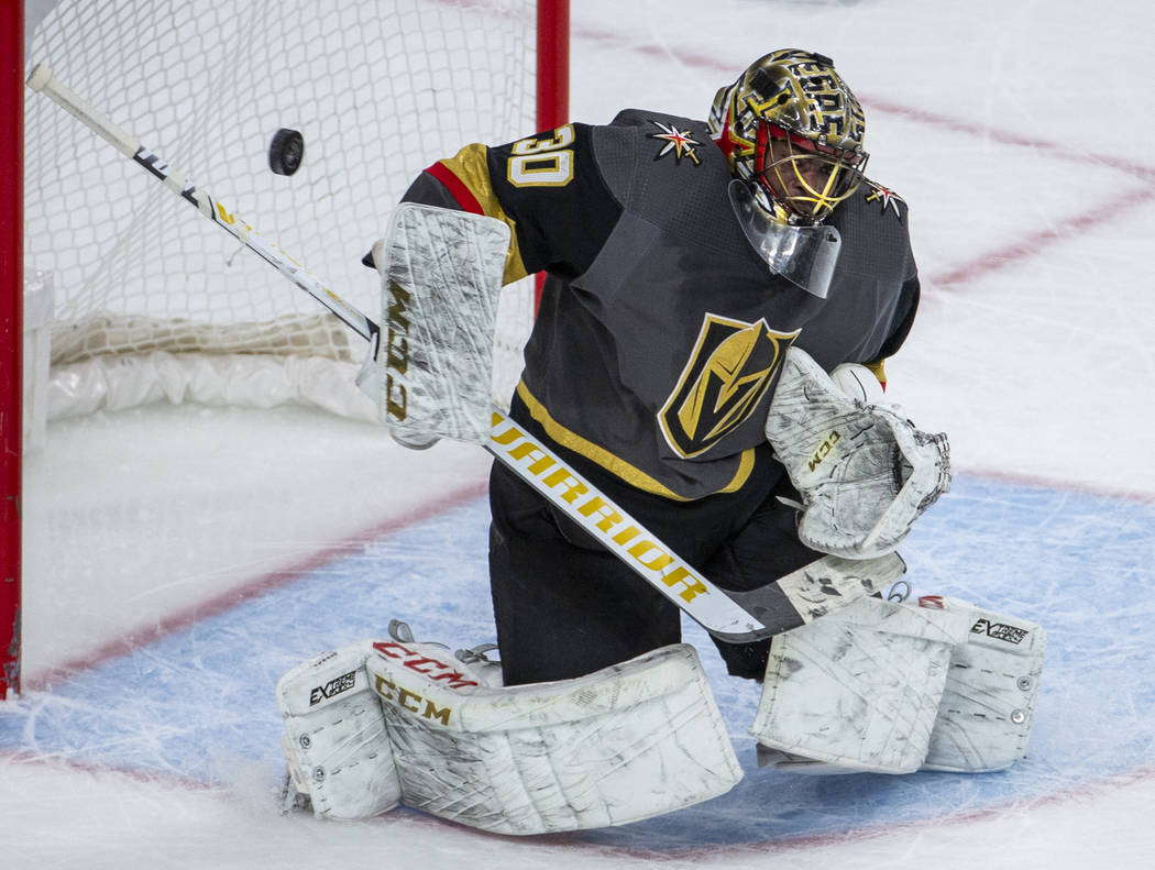 Vegas Golden Knights goaltender Malcolm Subban (30) deflects a shot on goal versus the Winnipeg ...