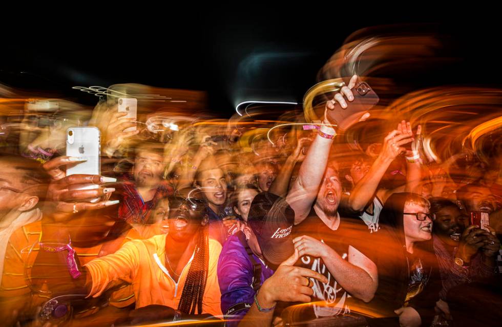 Fans cheer for Migos at the Jackpot stage during Day N Vegas music festival on Saturday, Nov. 2 ...