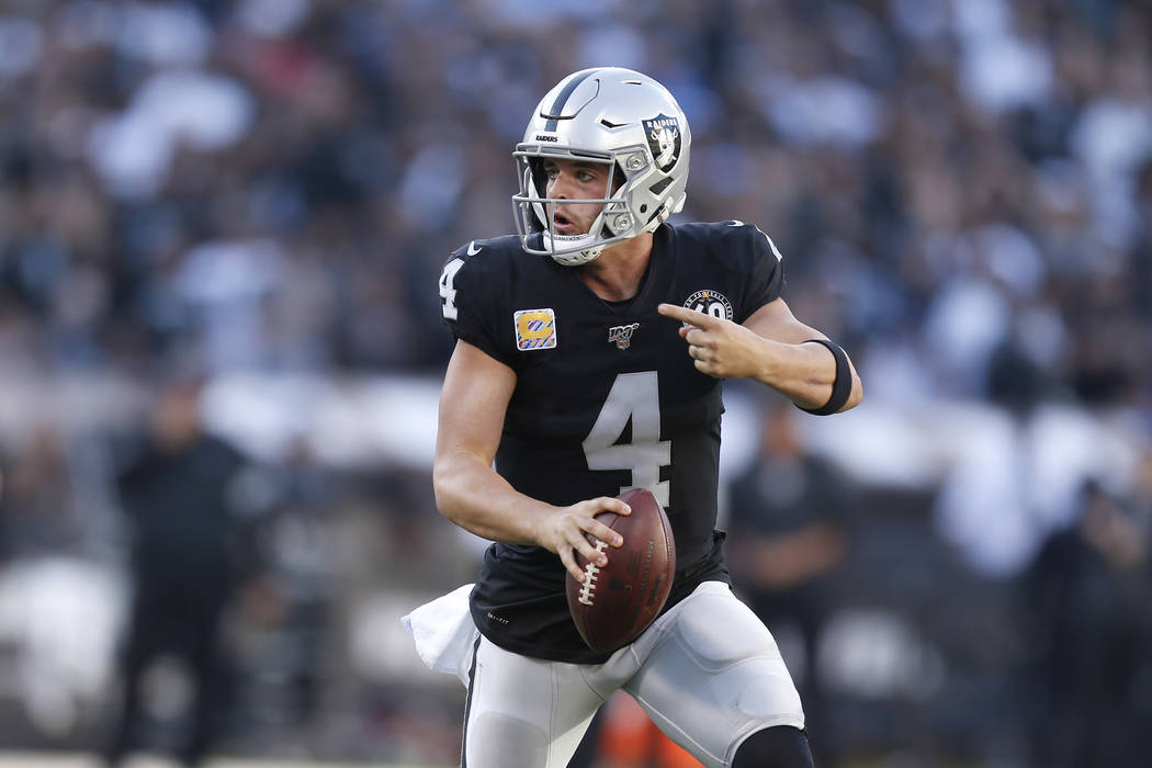 Oakland Raiders quarterback Derek Carr (4) scrambles against the Detroit Lions during the secon ...