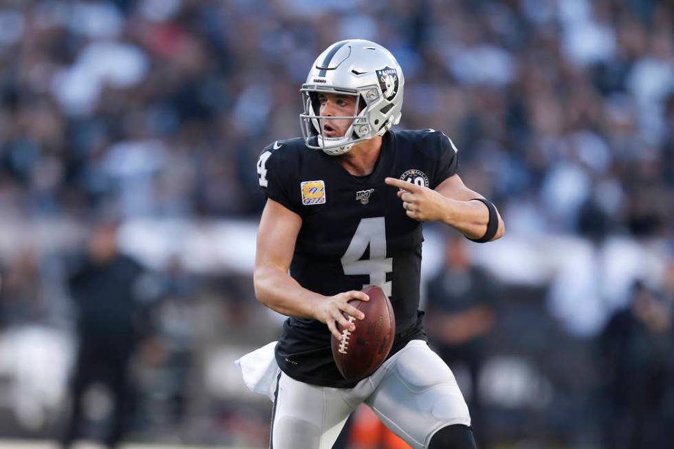 Oakland Raiders quarterback Derek Carr (4) scrambles against the Detroit Lions during the secon ...