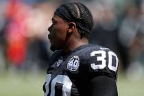 Oakland Raiders running back Jalen Richard warms up before an NFL football game against the Kan ...