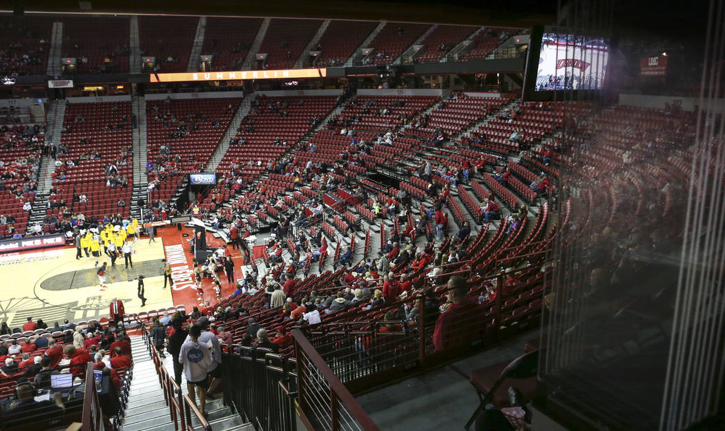 Rebels fans head to their seats minutes before UNLV plays UC Riverside in a basketball game at ...