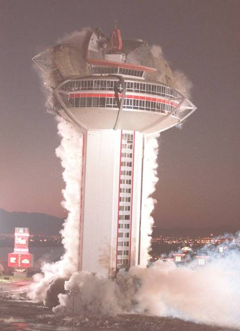 The tower of the Landmark hotel-casino comes crashing down during a planned implosion of the ic ...