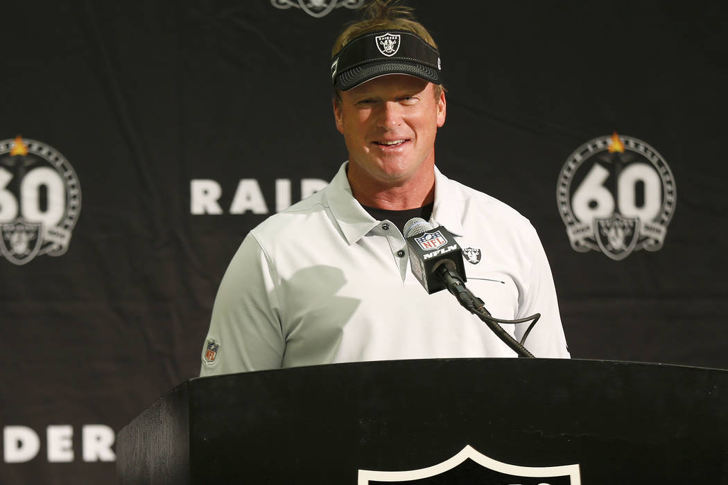 Oakland Raiders head coach Jon Gruden speaks at a news conference after an NFL football game ag ...